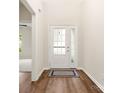 Welcoming foyer with hardwood floors leading to a bright, airy living space at 2105 Kennedy Dr, Indian Land, SC 29707