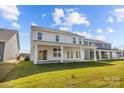 Expansive backyard featuring a covered patio, perfect for outdoor entertaining and relaxation at 633 Amberjack Pl, York, SC 29745