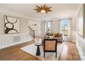 Bright living room featuring hardwood floors and large windows at 3012 Wheatfield Dr, Waxhaw, NC 28173