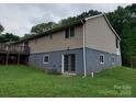 View of the back of the house with a deck and walkout basement at 2290 9Th Avenue Ne Dr, Hickory, NC 28601