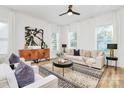 Bright living room features modern furnishings, stylish decor, and ample natural light creating an inviting space at 3230 Rogers St, Charlotte, NC 28208