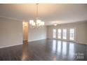 Bright dining room with hardwood floors and access to the backyard at 147 Fesperman Cir, Troutman, NC 28166