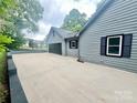 The exterior features a long driveway and a detached garage for two cars at 1586 Kenlane Dr, Hickory, NC 28601