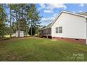 House exterior with a large backyard and screened porch at 902 Snow Prince Ln, York, SC 29745