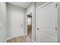 Bright hallway with light walls and neutral flooring at 2866 15Th Avenue Se Pl, Hickory, NC 28602