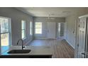 Open living area with hardwood-style floors, natural light, and a neutral color scheme at 2280 Dale Earnhardt Blvd, Kannapolis, NC 28083