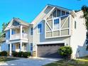 A home with stone accents, a large garage door, and neutral siding at 11521 Allen A Brown Rd, Charlotte, NC 28269