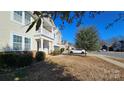 A home with a covered porch and well-manicured bushes at 11521 Allen A Brown Rd, Charlotte, NC 28269