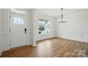 Bright foyer with light-colored wood flooring, white walls, and a view of the front yard at 8736 Acadia Pkwy # 601, Sherrills Ford, NC 28673