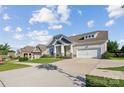 Attractive home exterior in a neighborhood setting with well-maintained lawns and driveways at 16004 Deer River Rd, Charlotte, NC 28278