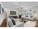 Bright living room with hardwood floors and a cozy fireplace at 181 Atwater Landing Dr, Mooresville, NC 28117