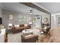 Spacious living room featuring hardwood floors and a decorative beam at 4972 Mayble St, Catawba, NC 28609