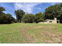 Property view showcasing the house and a large grassy area at 1762 Old Carter St, Lancaster, SC 29720