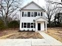 Newly constructed two-story home with walkway at 127 Sharon Rd, York, SC 29745