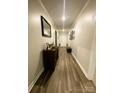 Bright and spacious entryway with wood-look flooring and stylish decor at 3524 Tully Ave, Kannapolis, NC 28081