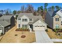 A beautiful two-story home with a two-car garage and large lawn at 225 English Arbor Dr # 13, Fort Mill, SC 29715