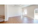 Bright dining area with hardwood flooring and access to backyard at 3558 Nimbell Rd, Monroe, NC 28110