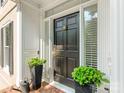 Close-up of the home's black front door with lion knocker at 1218 Wareham Ct, Charlotte, NC 28207