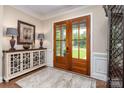 Bright entryway with wood floors and double doors at 859 Irish Creek Dr, Landis, NC 28088