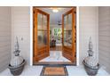 Open double doors reveal the interior at 859 Irish Creek Dr, Landis, NC 28088