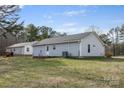 Wide view of the home's exterior showing the yard, as well as the siding and roof at 101 Turner Dr, Clover, SC 29710