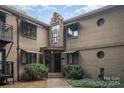 Exterior view of a brick building with a central entrance at 2423 Vail Ave # A12, Charlotte, NC 28207