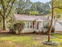 One-story house with red roof,needs some TLC at 2117 Laburnum Ave, Charlotte, NC 28205