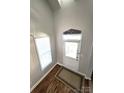 Bright entryway with hardwood floors and a decorative rug at 1561 Wilburn Park Ln, Charlotte, NC 28269