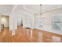 Bright dining room with hardwood floors and chandelier at 3015 Duclair Ln, Fort Mill, SC 29707