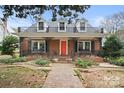 Two-story brick home with a charming front porch at 515 S Academy St, Lincolnton, NC 28092