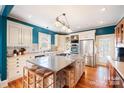 Spacious kitchen featuring an island and stainless steel appliances at 515 S Academy St, Lincolnton, NC 28092