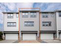 Townhouse exterior with a two-car garage, modern siding, and multiple windows allowing for ample natural light at 429 Nathaniel Way # Brx0032, Charlotte, NC 28213