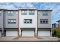 Townhome with a two-car garage, neutral paint, and complementary trim and windows at 437 Nathaniel Way # Brx0034, Charlotte, NC 28213