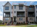 Attractive townhome showcasing a brick foundation, private balcony, and contemporary architectural details at 428 Nathaniel Way # Brx0044, Charlotte, NC 28213