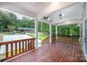 Spacious front porch offering views of the backyard and surrounding neighborhood at 312 General As Johnston St, Stanley, NC 28164