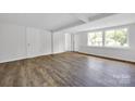 Bright living room with hardwood floors and neutral color palette at 123 Market Rd, Mooresville, NC 28115