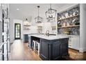 Spacious kitchen with a large island, stainless steel appliances, and stylish cabinetry at 5523 Closeburn Rd, Charlotte, NC 28210