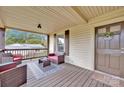 Inviting front porch with wicker furniture, perfect for relaxing at 410 Gaddy St, Kannapolis, NC 28081