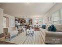 Open living room with views into the kitchen at 984 Kirby Dr, Fort Mill, SC 29715