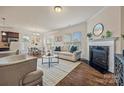 Bright living room features a fireplace and ample natural light at 984 Kirby Dr, Fort Mill, SC 29715