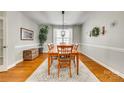 Dining room with wood table and chairs on an area rug at 6421 Chadwell Ct # 61, Fort Mill, SC 29707