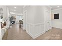 Bright entryway with hardwood floors and coat closet at 2040 White Cypress Ct # Kh09, Charlotte, NC 28216