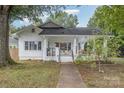 White house with a porch and walkway, nice yard at 317 Kerr Nw St, Concord, NC 28025