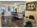 Bright, modern kitchen with stainless steel appliances and central island with chairs at 331 Sunderland Rd, Belmont, NC 28012