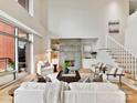 Comfortable living room with stone fireplace, modern seating, and large windows at 435 S Tryon St # 301, Charlotte, NC 28202