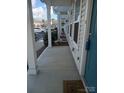 Townhome side porch with concrete flooring and access to multiple units at 13969 Clayborn St, Midland, NC 28107