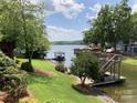 Beautiful waterfront property with a private dock, boat house and lake views at 24756 Strand Dr, Albemarle, NC 28001