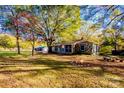 Charming stone cottage with fire pit and large trees at 5011 Lewis Rd, Gastonia, NC 28052