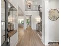 Bright and spacious entryway with hardwood floors and high ceilings at 8115 Farm Crossing Ln # 3, Huntersville, NC 28078