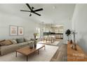 Bright open-concept living room and kitchen with modern decor and plenty of natural light at 414 Clinton Ave, Lancaster, SC 29720